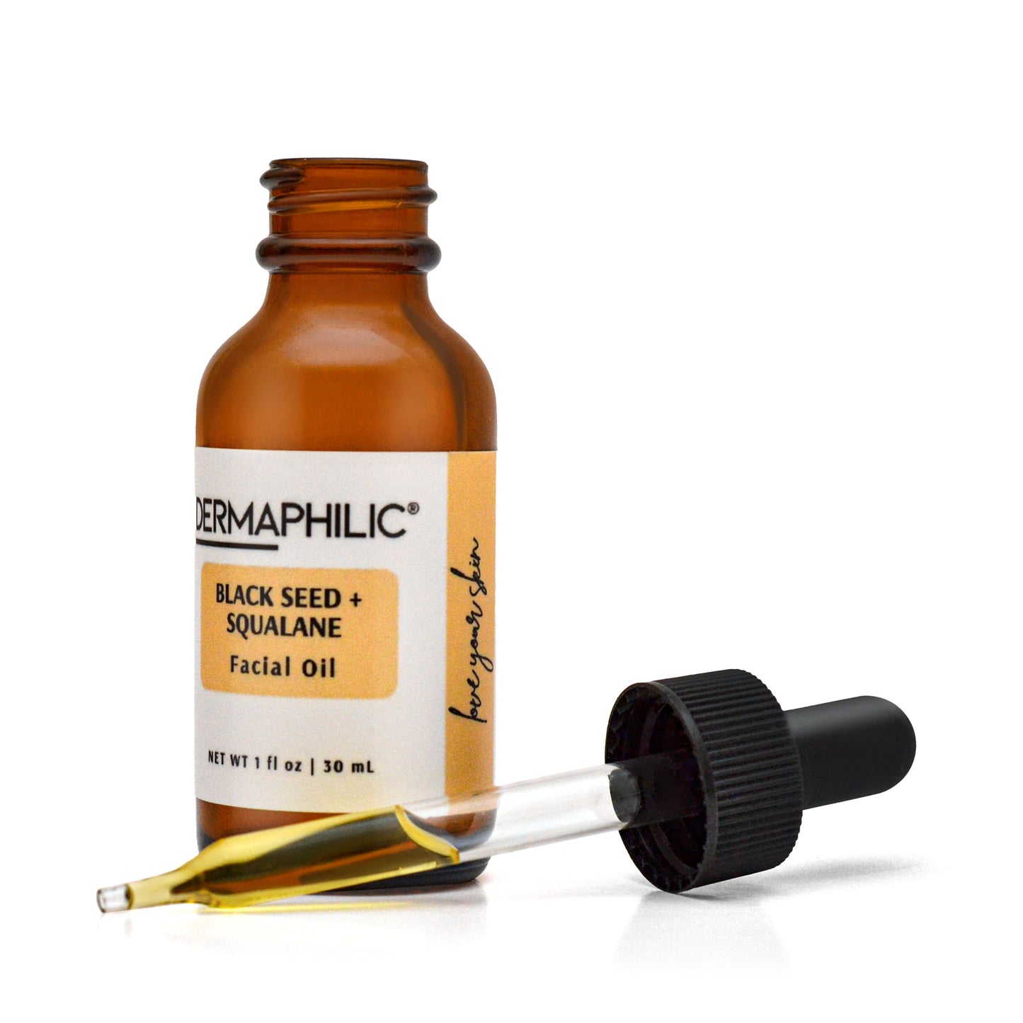 Amber glass bottle labeled 'Dermaphilic Black Seed + Squalane Facial Oil' with dropper on side of bottle filled with translucent yellow oil on a white background
